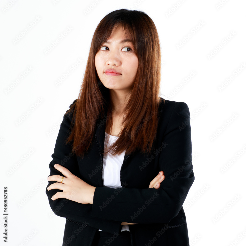 Young and fresh new graduated look Asian businesswoman in suit pose in doubt and suspect face on white background Young and fresh new graduated look Asian businesswoman in suit pose in doubt and suspect face on white background