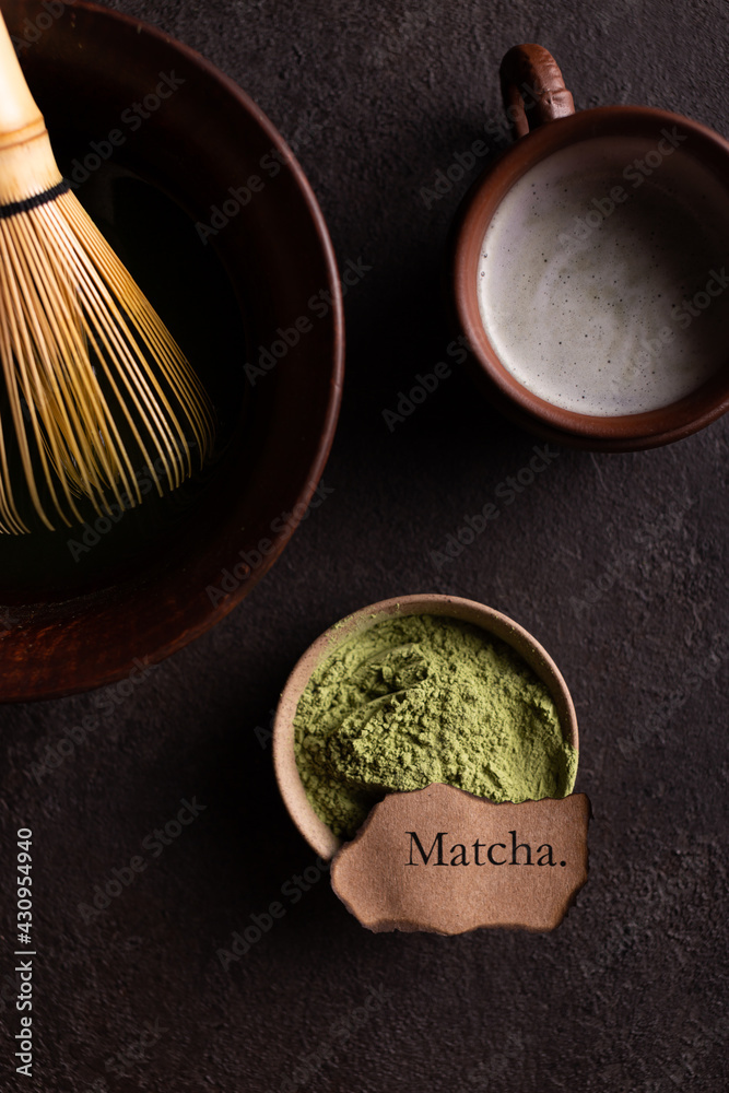 Powdered matcha tea in a bowl Powdered matcha tea in a bowl