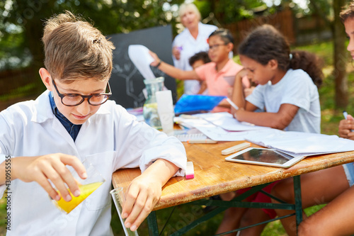 Children make experiments with reagents
