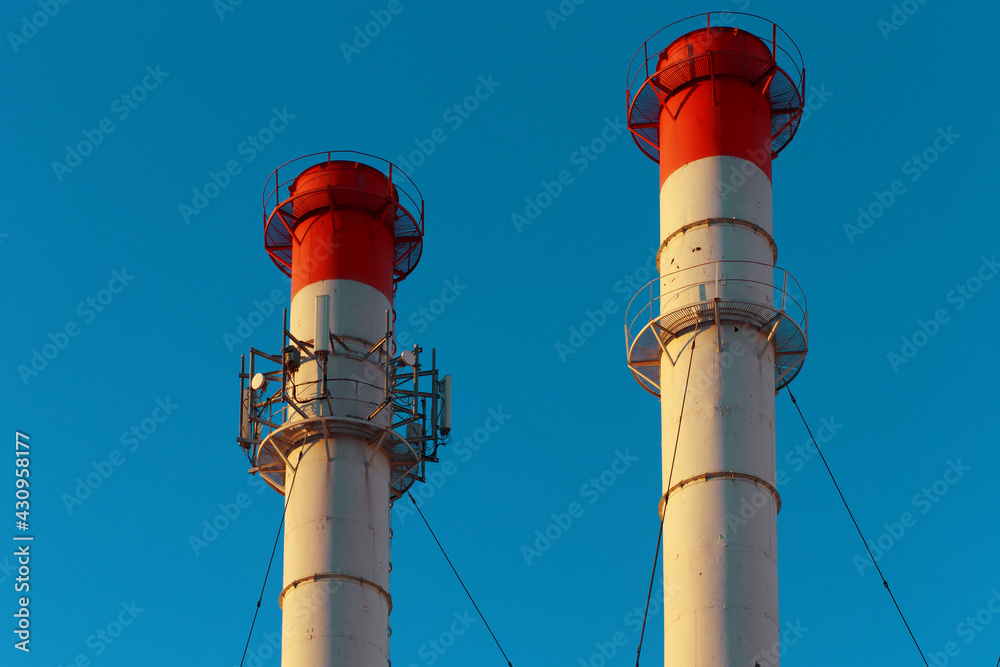 Chimneys of the power plant against the sky.
Chimneys of the power plant against the sky.
