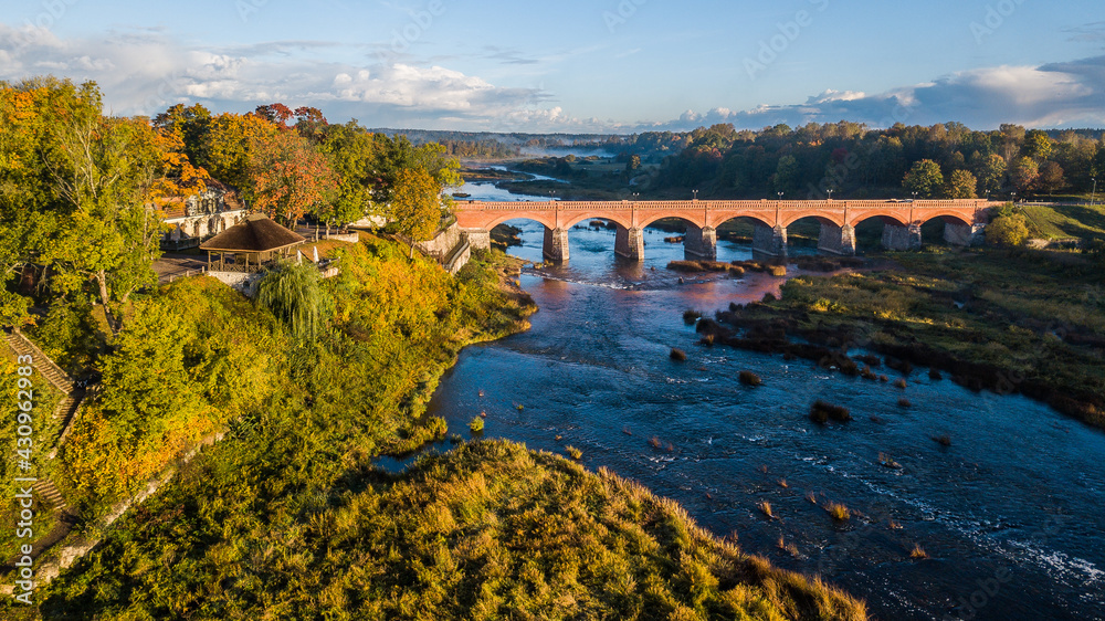 Fototapeta premium Long brick bridge, Kuldiga, Latvia. Captured from above.