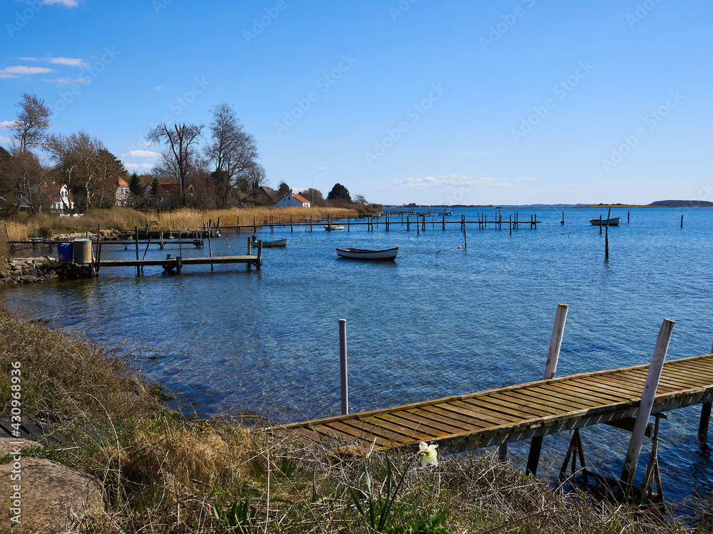 Small wooden pier jetty in  Funen Denmark