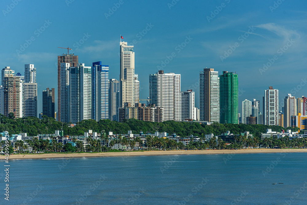 Joao Pessoa, Paraiba, Brazil on April 16, 2019. Partial view of Cabo Branco beach with the skyscrapers of the Altiplano neighborhood.