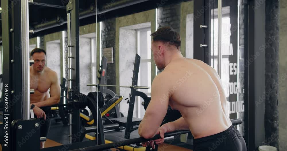 Handsome young athlete with a naked torso. Health, sport concept . Handsome young athlete with a naked torso. Health, sport concept .