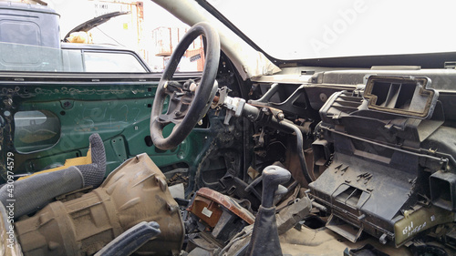 car dismantling for parts, dismantled car interior, auto parts, auto-dismantling market