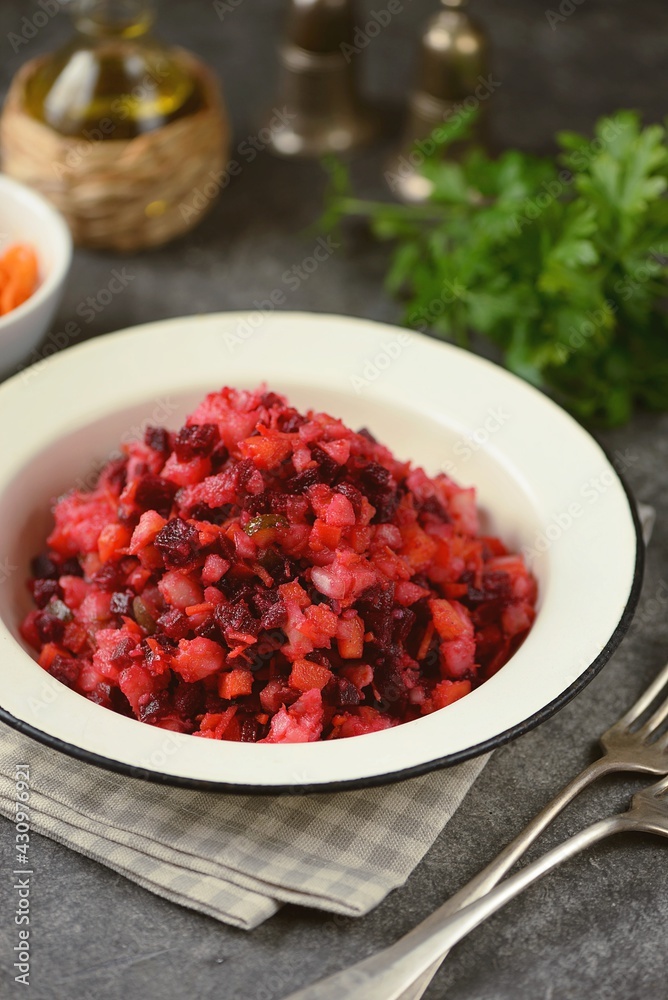 raditional salad Vinaigrette of beets, potatoes, carrots, pickles with onions and vegetable oil. raditional salad Vinaigrette of beets, potatoes, carrots, pickles with onions and vegetable oil.