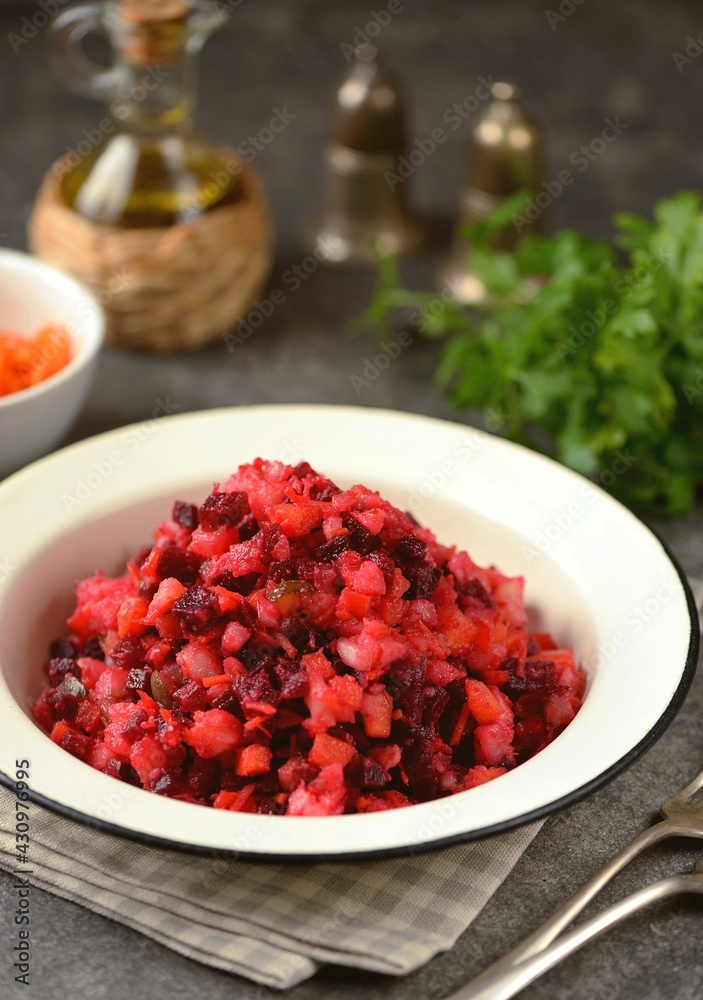 raditional salad Vinaigrette of beets, potatoes, carrots, pickles with onions and vegetable oil. raditional salad Vinaigrette of beets, potatoes, carrots, pickles with onions and vegetable oil.