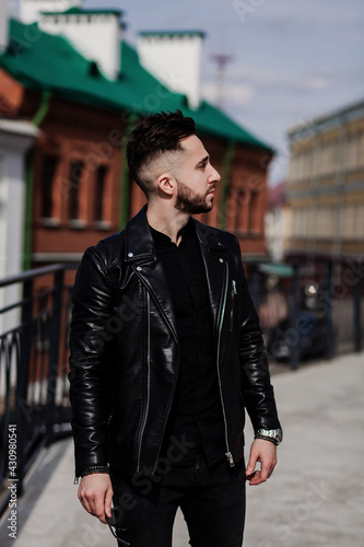 Fashionable man in leather jacket