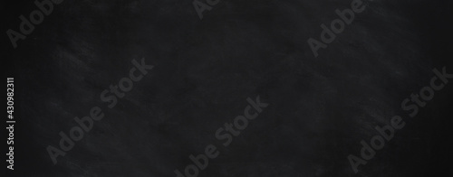 blackboard background with chalk smudge texture in wide web banner format photo