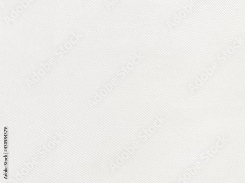 White cloth texture There are stripes of fibers of the fabric, gray-white tone. Use this for wallpaper or background image. There is a blank space for text.