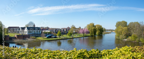 Village of Asperen on the Linge river in early spring, netherlands