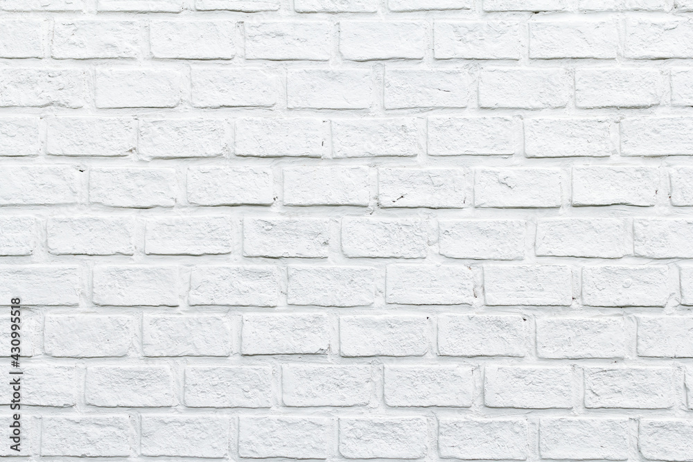 Fototapeta premium The Modern white brick wall texture for background. abstract design background