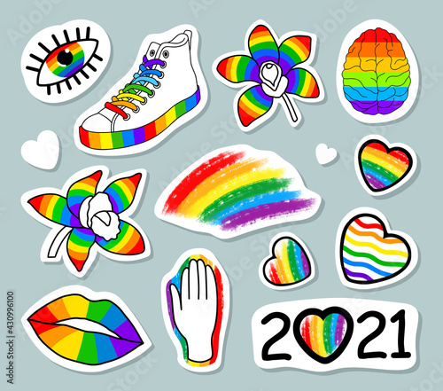 big set of lgbt stickers. colorful design of elements and symbols. hand drawn illustration for pride month.  flowers, rainbow-colored brain, eyes, sneakers, hearts