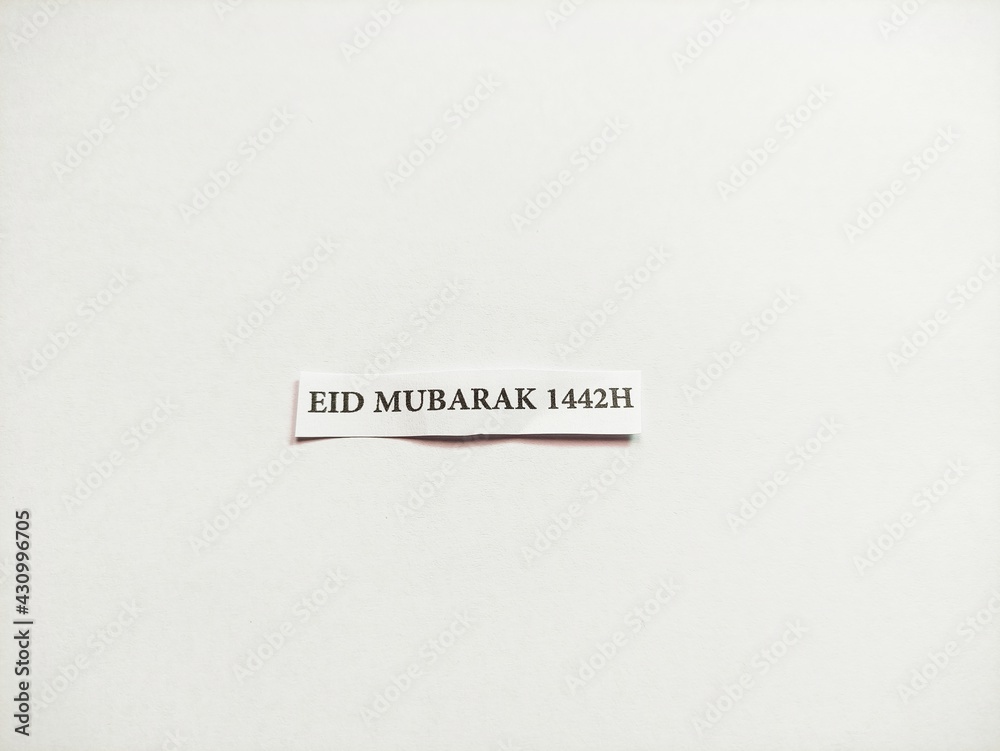a small white piece of paper inscribed on muslim celebration day a small white piece of paper inscribed on muslim celebration day