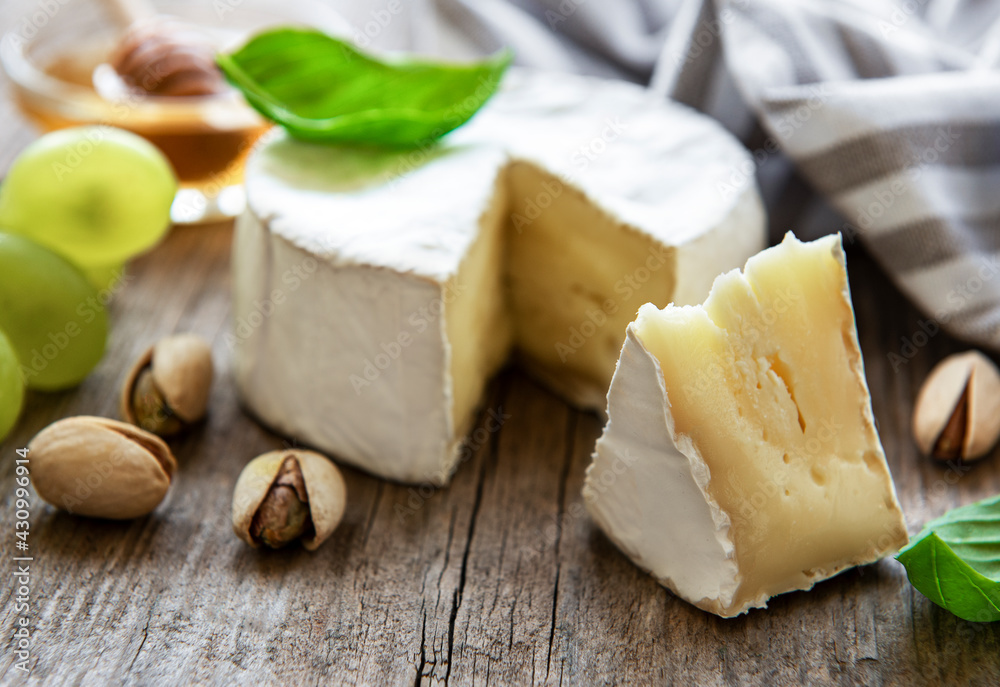 Camembert cheese with snacks