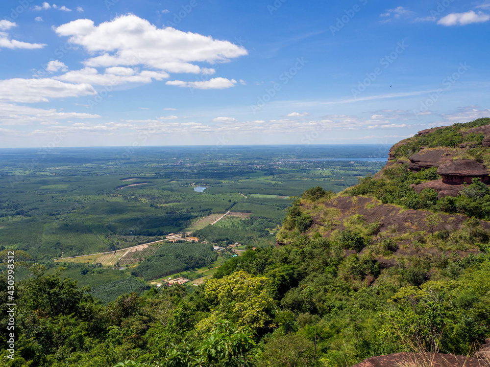 The beautiful top of the big rock on a mountain, blue sky, and the forest in Unseen Thailand of Phu Langka National Park, Nong Khai, Thailand.