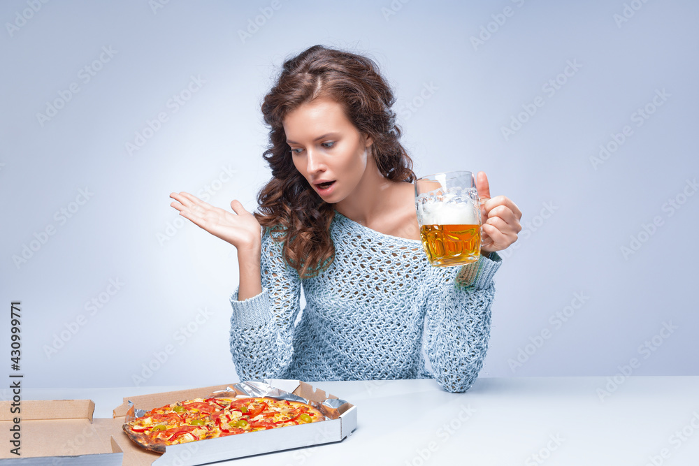 Happy woman with pizza and beer on grey background, space for text Happy woman with pizza and beer on grey background, space for text