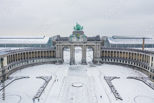 Aerial view of Arc du Cinquantenaire, a stately triple arch monument in wintertime, Brussel, Belgium.