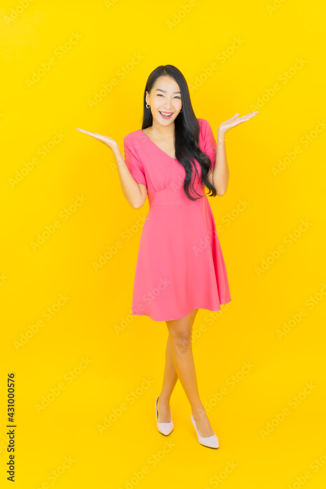 Portrait beautiful young asian woman smile with action Portrait beautiful young asian woman smile with action