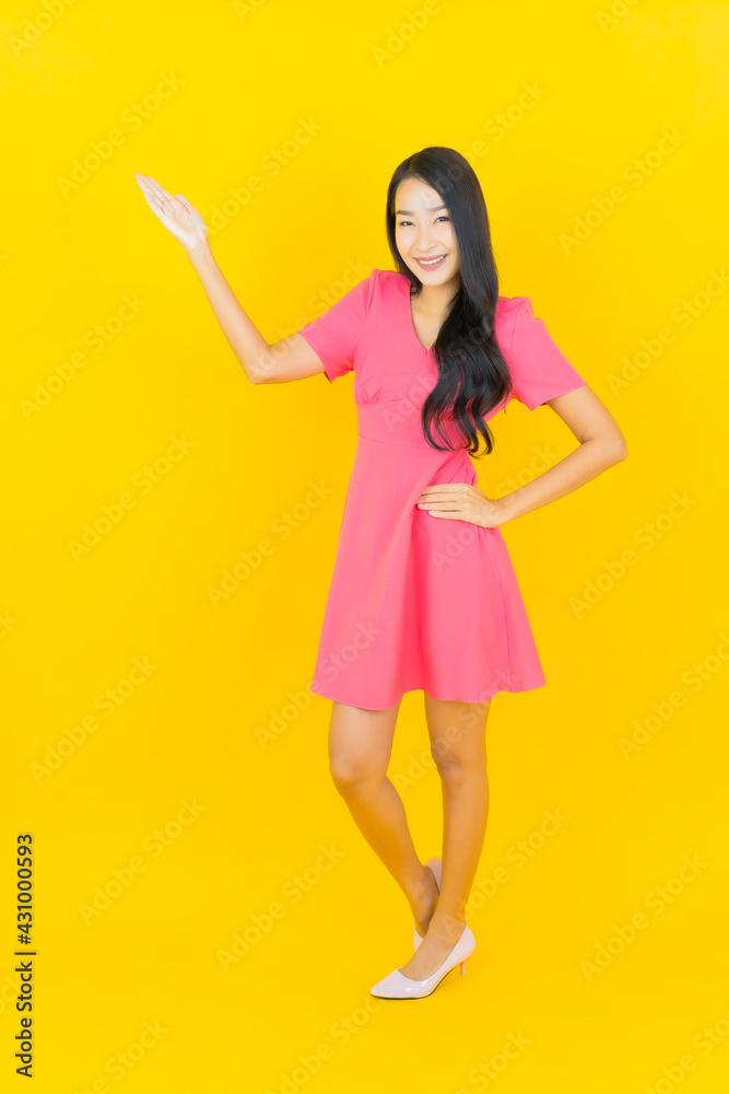 Portrait beautiful young asian woman smile with action Portrait beautiful young asian woman smile with action
