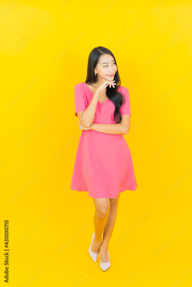Portrait beautiful young asian woman smile with action Portrait beautiful young asian woman smile with action
