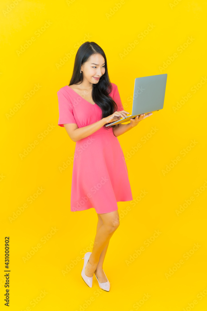 Portrait beautiful young asian woman smile with computer laptop Portrait beautiful young asian woman smile with computer laptop
