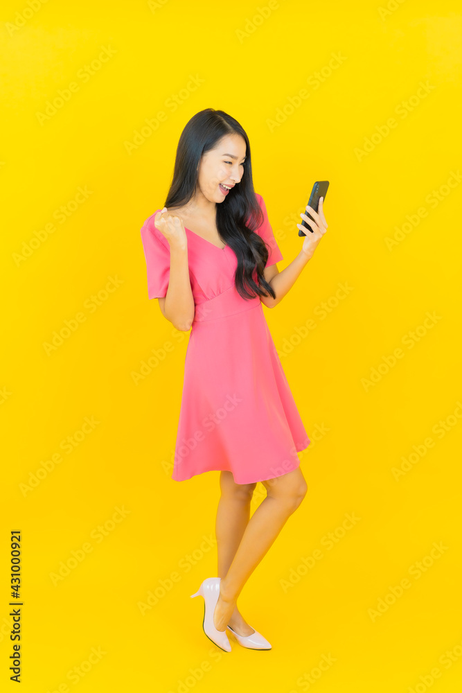 Portrait beautiful young asian woman smile with smart mobile phone Portrait beautiful young asian woman smile with smart mobile phone