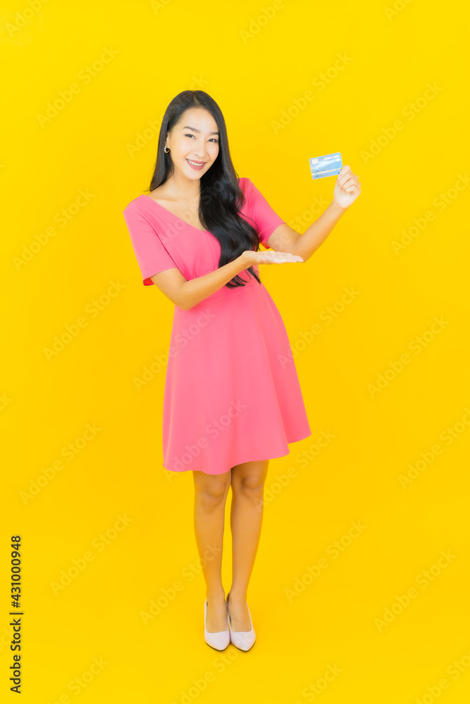 Portrait beautiful young asian woman smile with credit card Portrait beautiful young asian woman smile with credit card