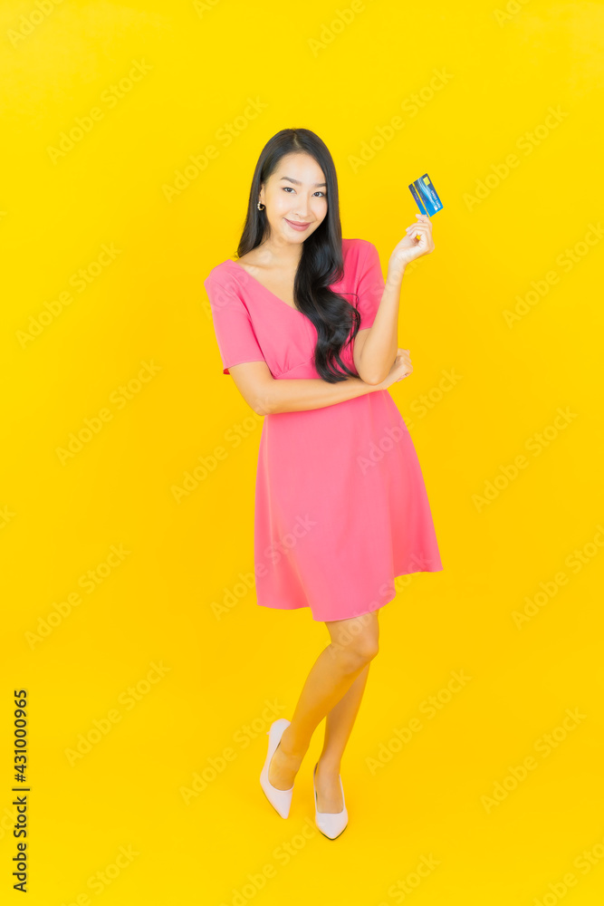 Portrait beautiful young asian woman smile with credit card Portrait beautiful young asian woman smile with credit card