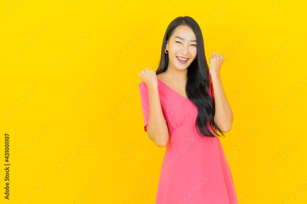Portrait beautiful young asian woman smile with action Portrait beautiful young asian woman smile with action