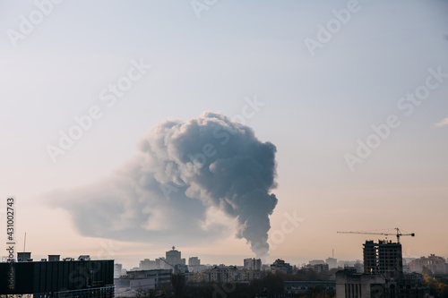 Smoke pollution in a city. Building burning, massive fire. © Bostan Natalia