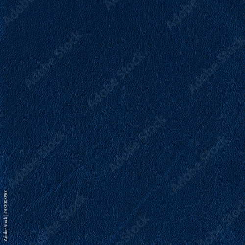Bright blue leather background. Skin texture