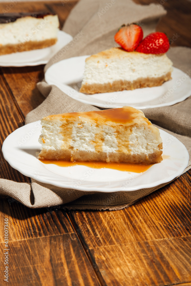 cheesecake on wooden background, new york cheesecake cheesecake on wooden background, new york cheesecake