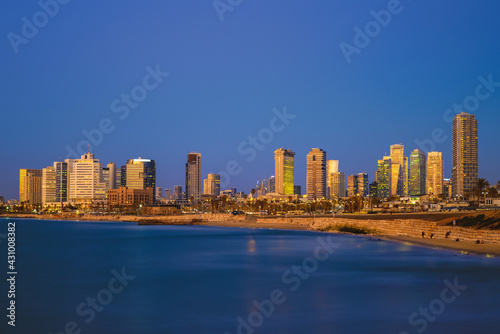 skyline of Tel Aviv, Israel at the beach in the evening