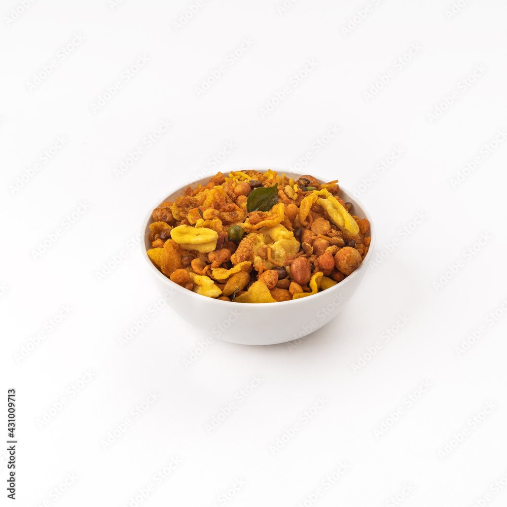 mix farsan or farsaan in a white bowl or plate mix farsan or farsaan in a white bowl or plate