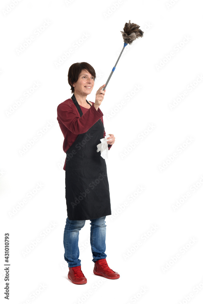 woman with duster and dusting paper on white background woman with duster and dusting paper on white background