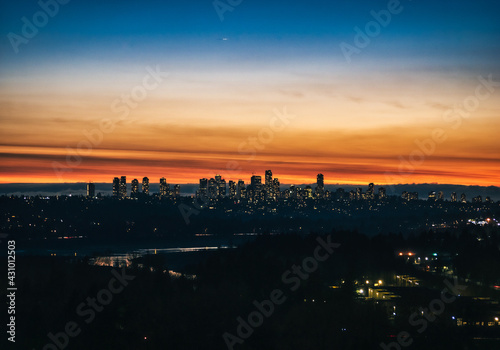 City of Metrotown on sunset sky background in Vancouver  British Columbia