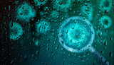 Coronavirus molecule figure on wet blue window with raindrops concept photo self isolation. Covid - 19 finish concept.