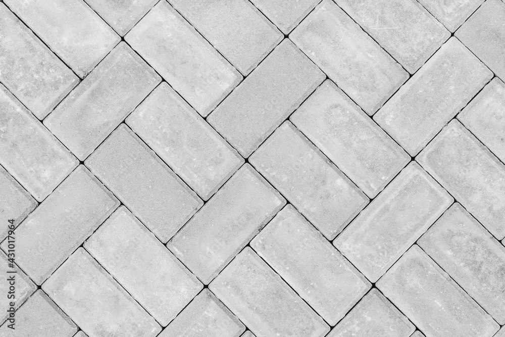 Gray paving slabs urban street road floor stone tile texture background