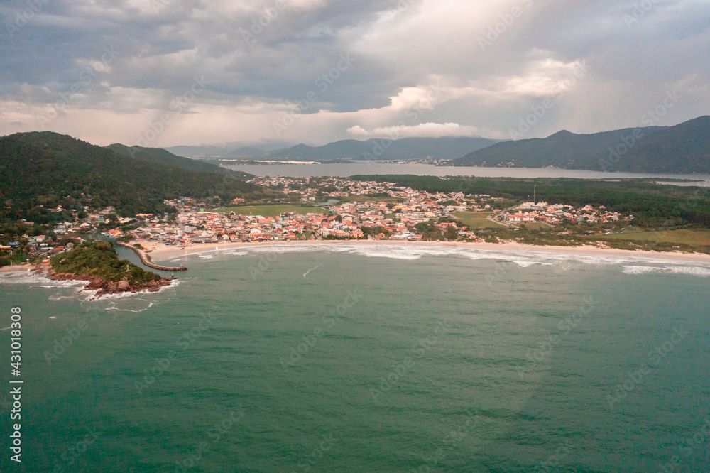 aerial image with drone from the beach Barra da Lagoa on the island of Florianópolis Santa Catarina Brazil at dawn