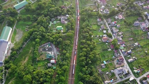 Drone view of a moving freight train in the suburbs of Vladivostok