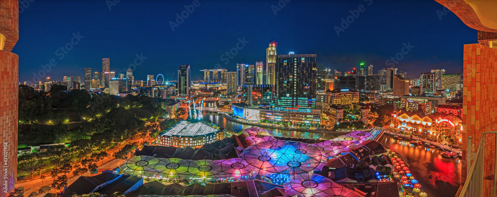 Naklejka premium Bird's eye panoramic view of Singapore skyline and Clarke Quay entertainment district