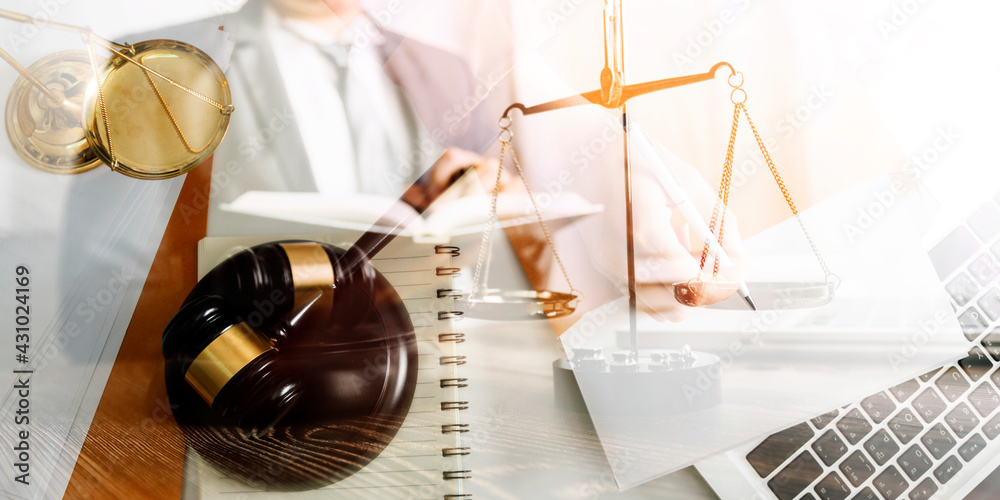 justice and law concept.Male judge in a courtroom on wooden table and Counselor or Male lawyer working in office. Legal law, advice and justice concept. justice and law concept.Male judge in a courtroom on wooden table and Counselor or Male lawyer working in office. Legal law, advice and justice concept.