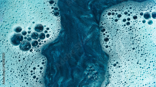 blue shimmery water with sparkles and bubbles