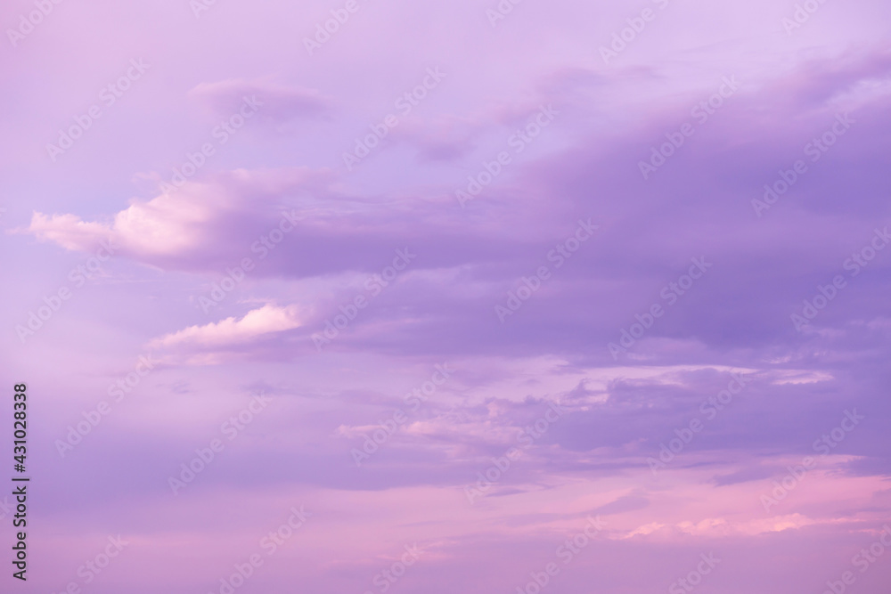 Epic dramatic sunrise, sunset purple pink violet blue sky with clouds abstract background texture