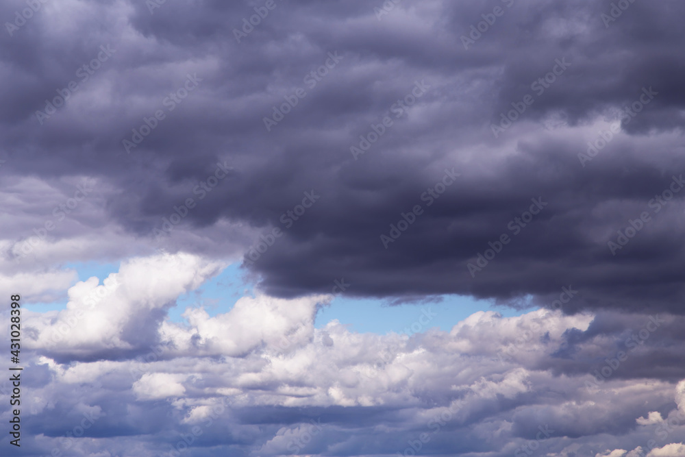 Epic dramatic Storm sky, dark grey and white cumulus clouds on blue sky background texture, thunderstorm Epic dramatic Storm sky, dark grey and white cumulus clouds on blue sky background texture, thunderstorm