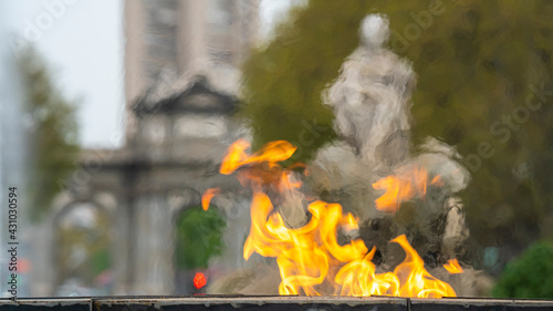 Plaza de Cibeles and statue of the goddess Cibeles overlooking the Puerta de Alcala in the city of Madrid in Spain