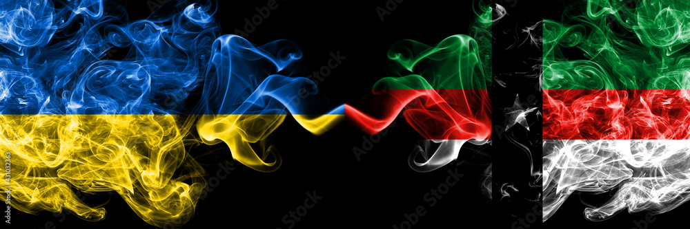 Fototapeta premium Ukraine, Ukrainian vs United States of America, America, US, USA, American, Denison, Texas smoky mystic flags placed side by side. Thick colored silky abstract smokes flags.
