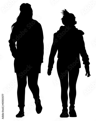 Young man and woman walking at street. Isolated silhouette on a white background