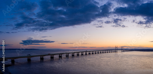 Severn Bridge crossing from England to Wales  at sunset. The bridge is also called the Prince of Wales Bridge